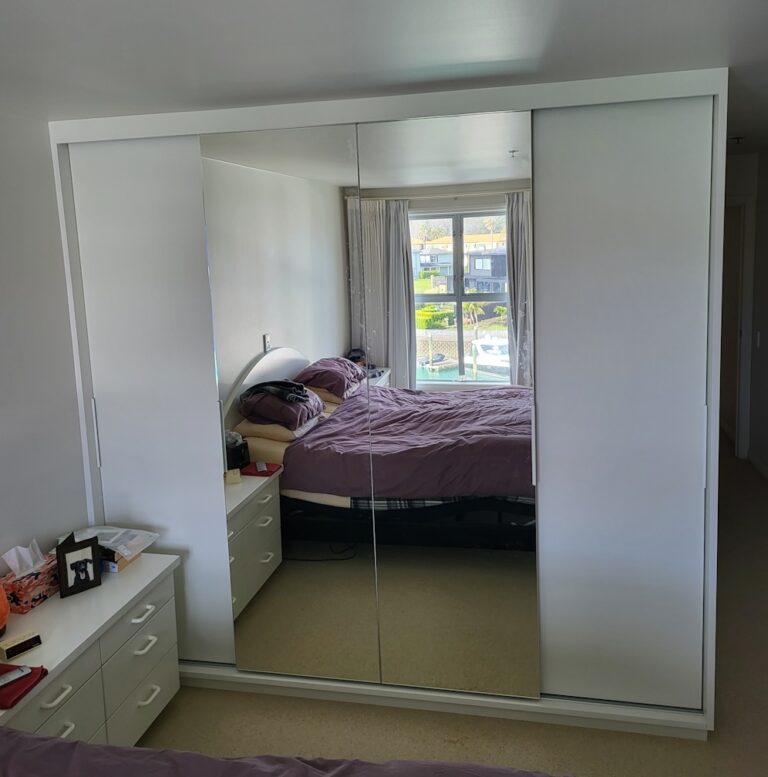 Wardrobe with mirrored doors